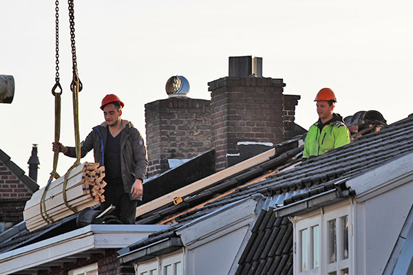 men at work on the roof
